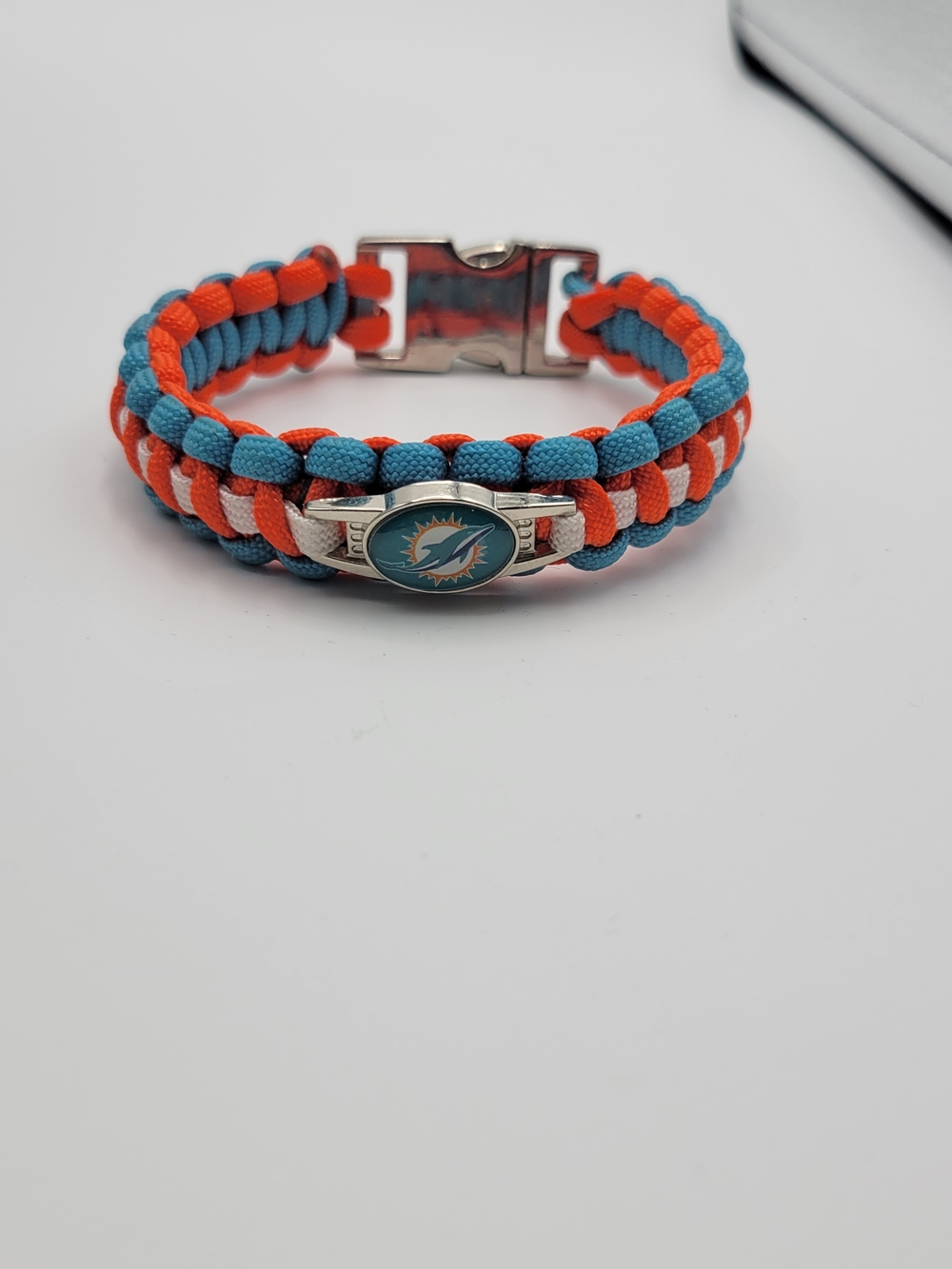 Miami Dolphins Paracord Bracelet in Aqua and Orange with silver tone metal